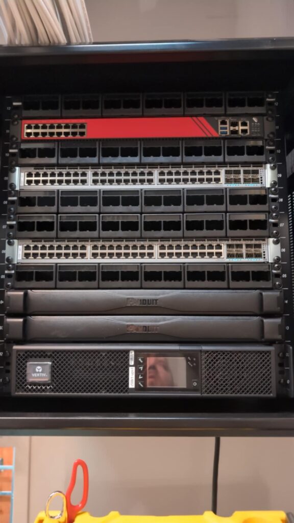 Network rack with switches installed in rack