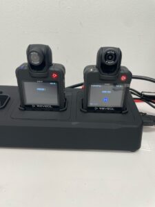 Body camera devices on charging dock